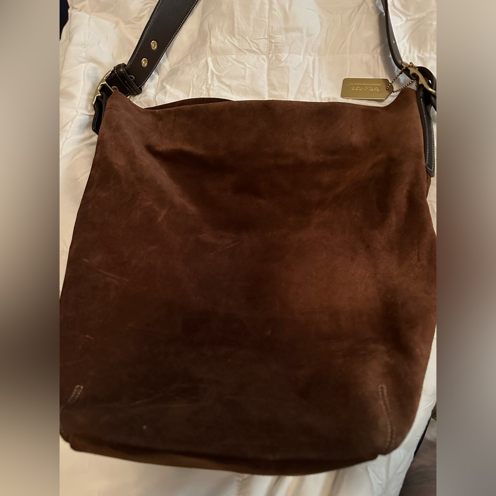 Brown suede Coach bag.